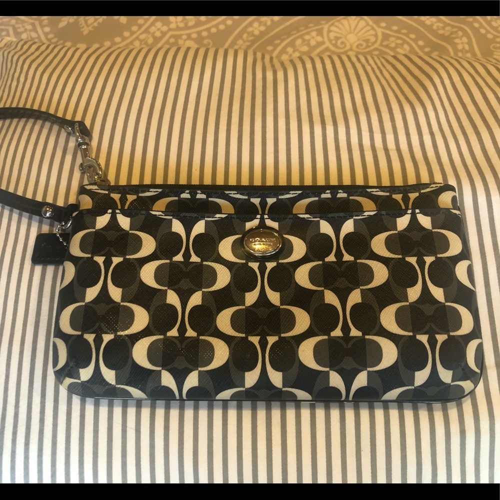 Coach wallet/clutch with strap.